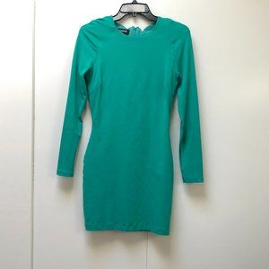 Green stretchy long sleeve short Bebe dress.  Size S
